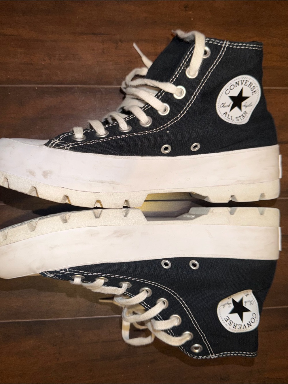 Black High-Top Converse Canvas Sneakers with White Toe
